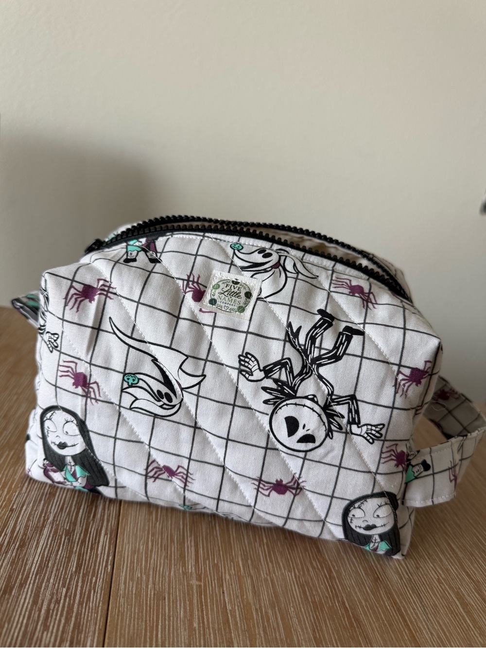The Nightmare Before Christmas Cosmetic Pouch - White with Black & Teal Accents